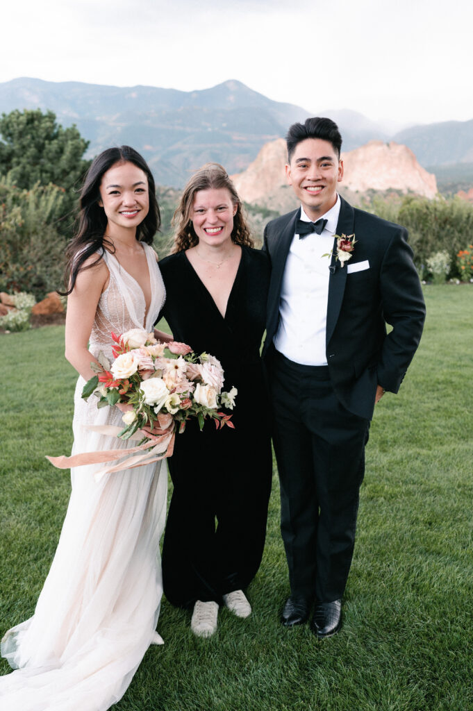 Skylar poses with a couple at Garden of the God's Resort and Club in Colorado Springs, Colorado.